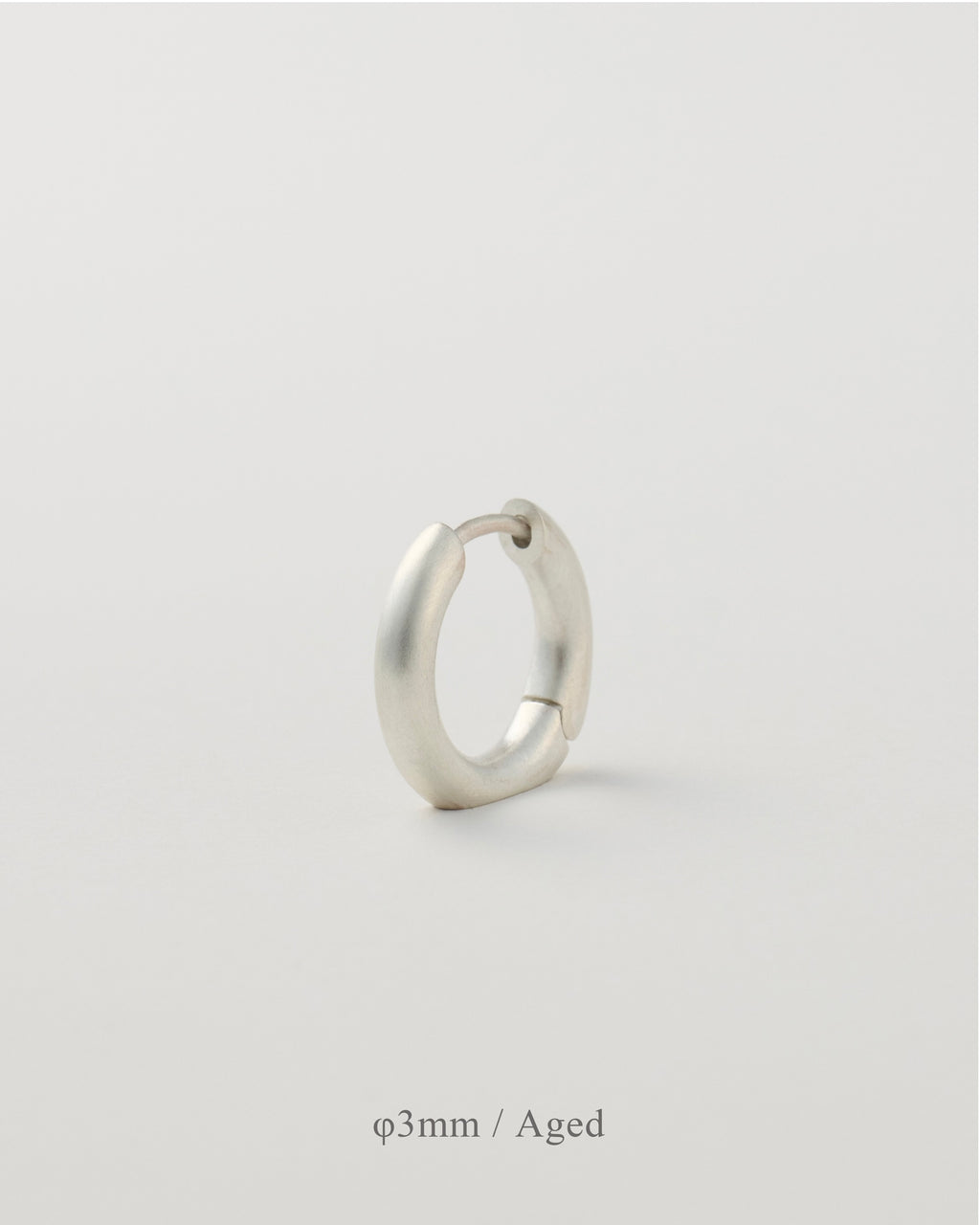 'Balanced' pierced earring