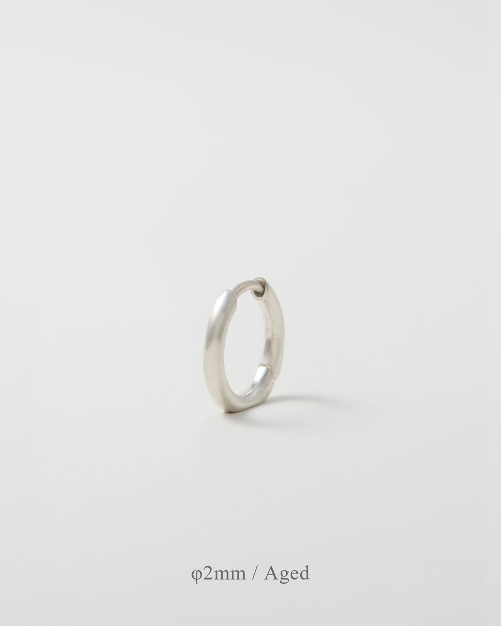 'Balanced' pierced earring