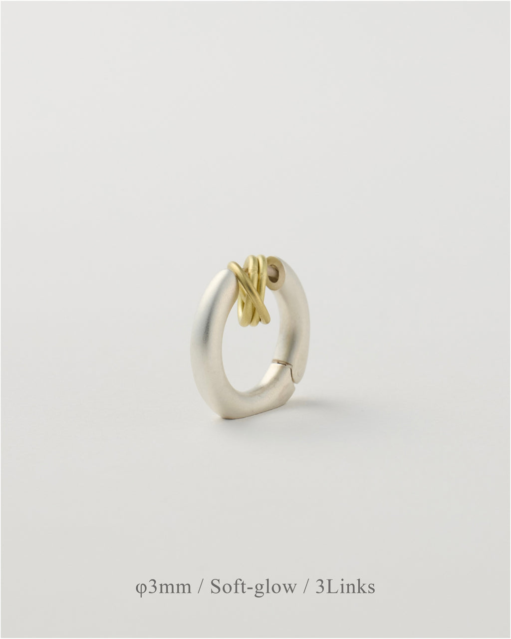 'Linked' pierced earring