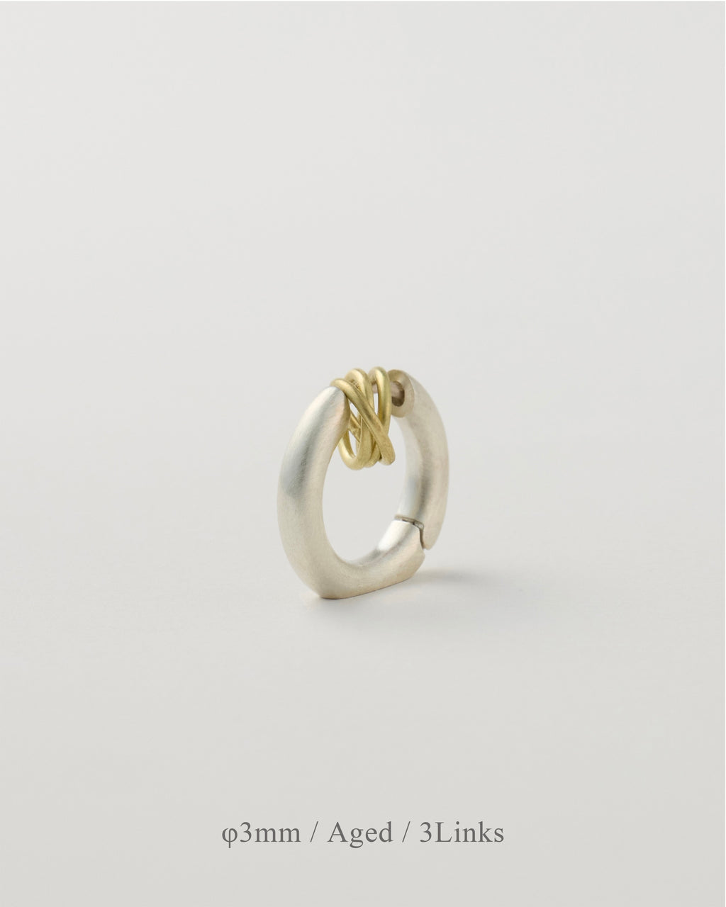 'Linked' pierced earring