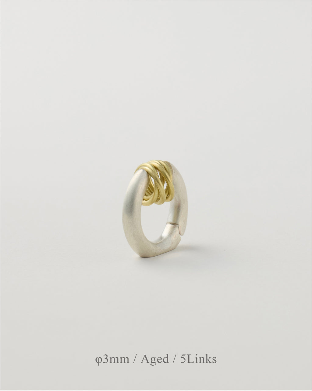 'Linked' pierced earring