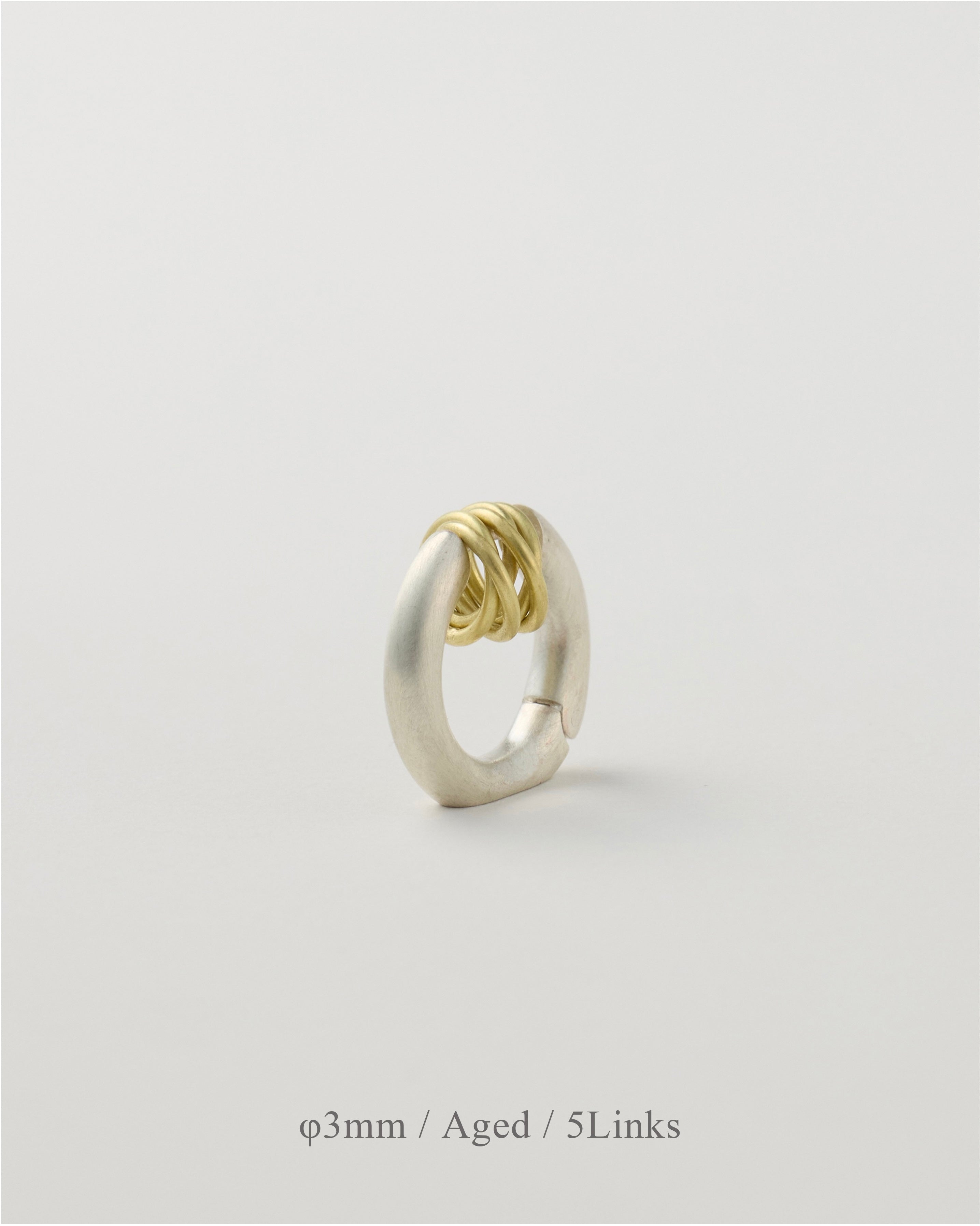 'Linked' pierced earring