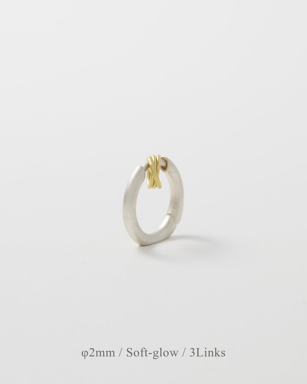'Linked' pierced earring