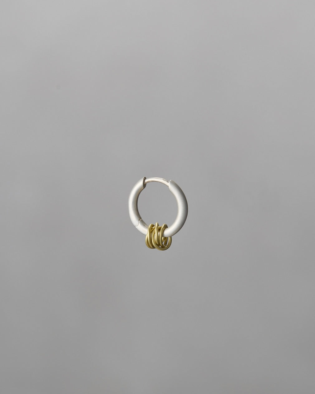 'Linked' pierced earring